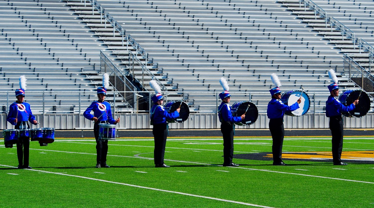 Quitman's drum line holds down the beat. [see more marching success]